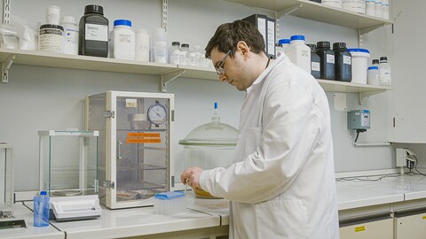 Polychim lab worker